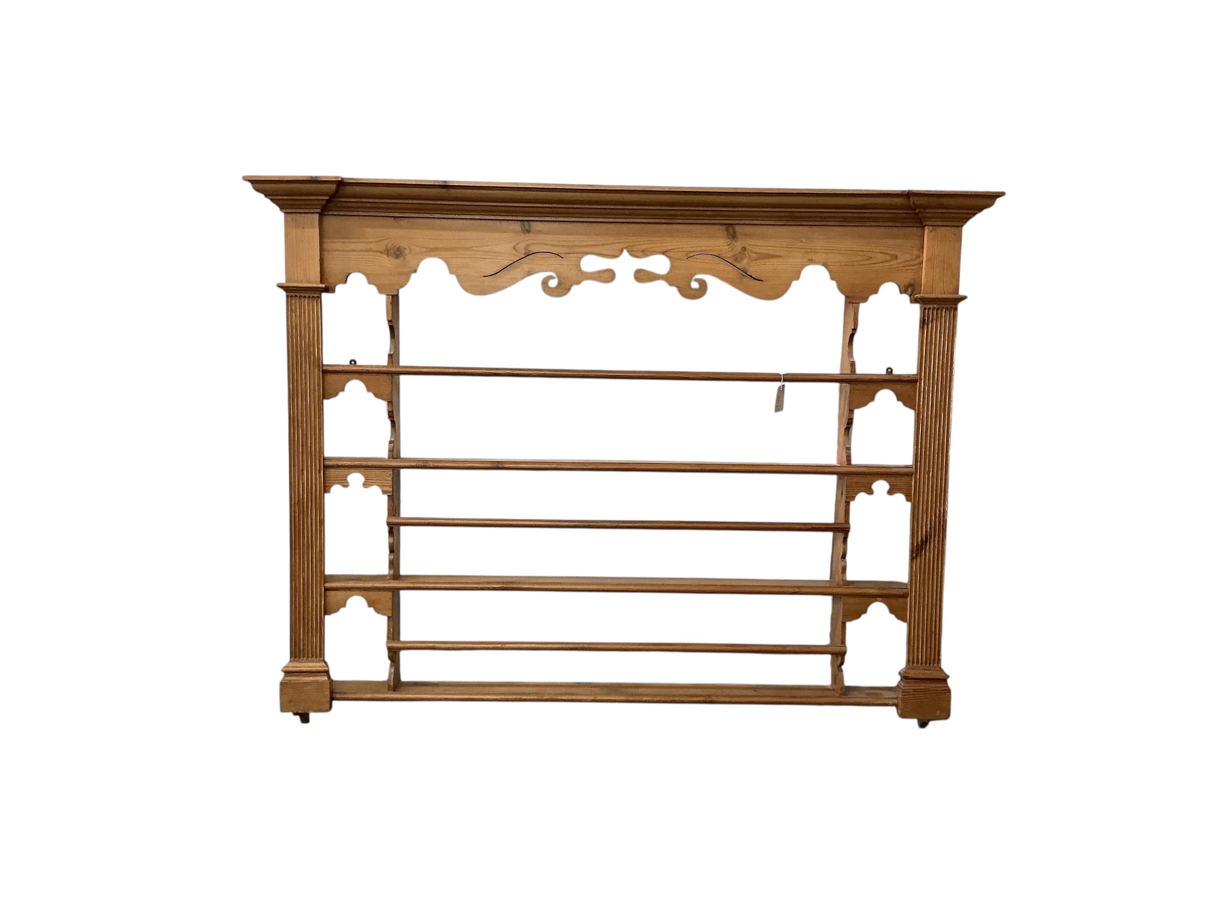 A George III style pine plate rack, width 176cm, height 127cm